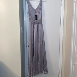 Wayne Cooper 100% silk long dress with side zipper. Never been worn
